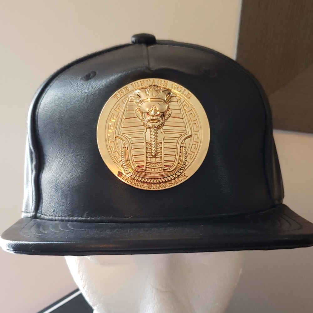 Faux leather snapback gold center piece pharaoh